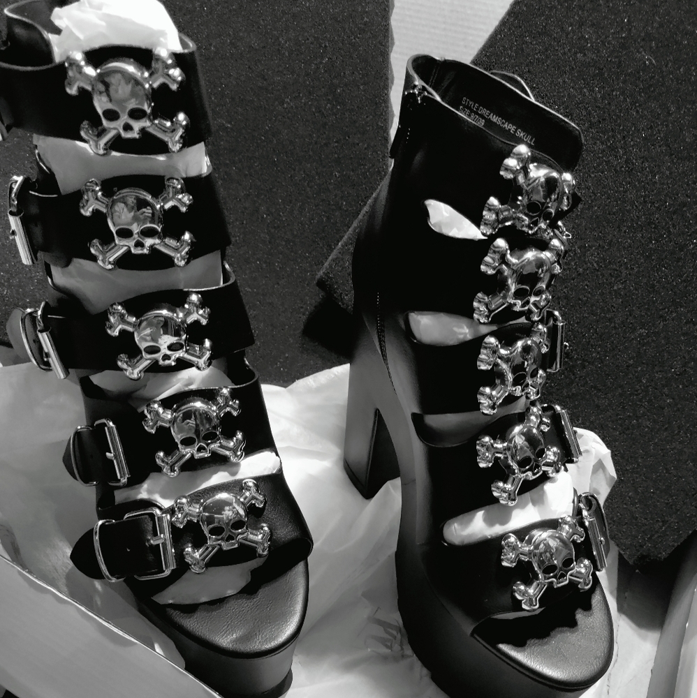 Brand New platform heels with ☠️ on the front